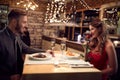 Romantic couple have dinner in restaurant